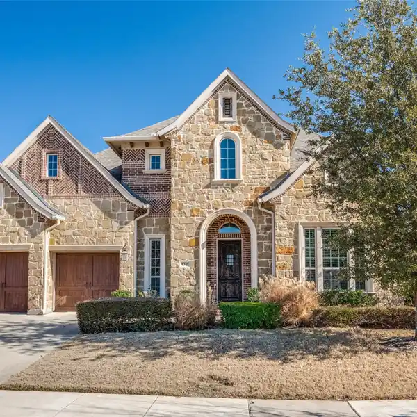 TWO-STORY ELEGANCE WITH RESORT-STYLE COMMUNITY