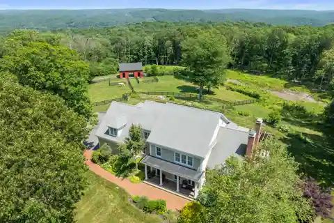 Refined Farmhouse Retreat on 10+ Acres