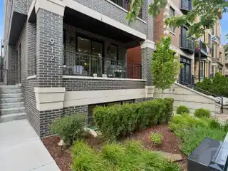 Sprawling Duplex Down That Lives Like a Single-Family Home