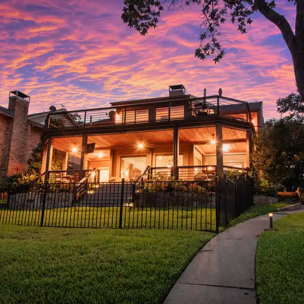 TURNKEY LAKEFRONT HOME WITH EXCEPTIONAL OUTDOOR AMENITIES