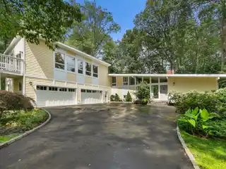 Spacious Sun-Filled Home on a Landscaped Acre