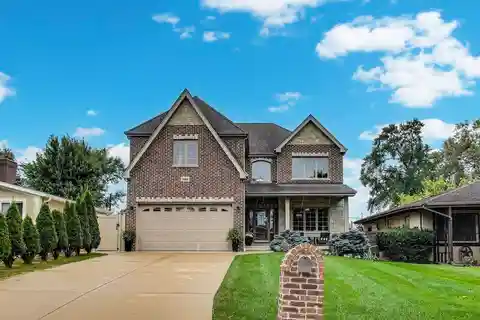Spacious Brick Home with Luxurious Upgrades