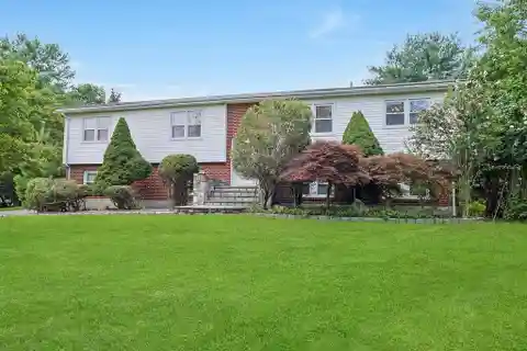 Impeccably Maintained Raised Ranch