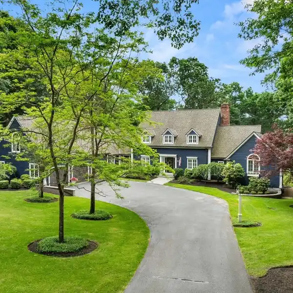 CLASSIC CHARM WITH MODERN LUXURY IN THE WOODS OF BOXFORD