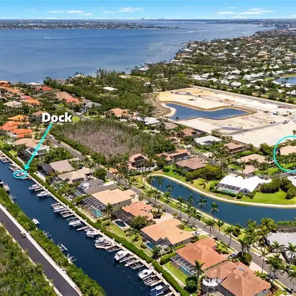 CUSTOM WATERFRONT HOME IN GATED CATALPA COVE