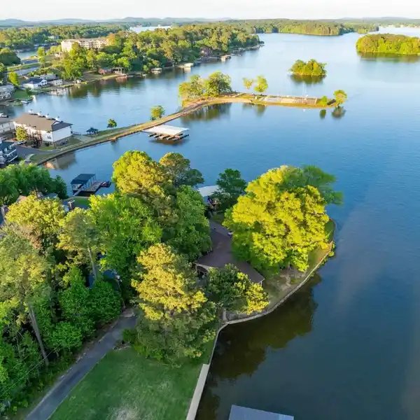 UNMATCHED LAKEFRONT LIVING ON A PRIVATE PENINSULA POINT