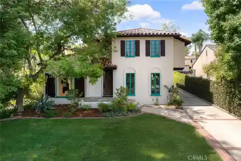 Timeless Spanish Revival on a Serene Cul-De-Sac