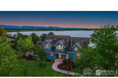 Serene Lakefront Living with Spacious Patio