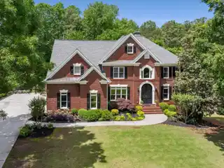 Traditional-style Masterpiece in Prestigious Falls of Autry Mill