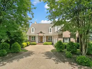 Timeless Brick Estate with Captivating Water Views