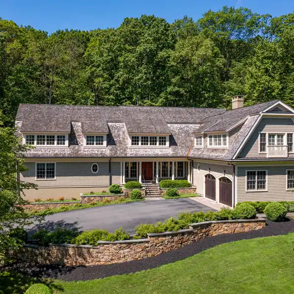 STUNNING HOME ON NEARLY SEVEN ACRES