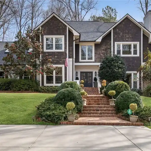 UPDATED HOME ON A SPRAWLING ACRE LOT