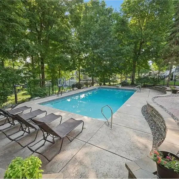 BEAUTIFUL CUSTOM TWO STORY HOME LOCATED IN WOODS AT THE WILD