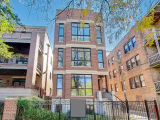 Exquisite Brick Duplex with Sophisticated Entertaining Spaces