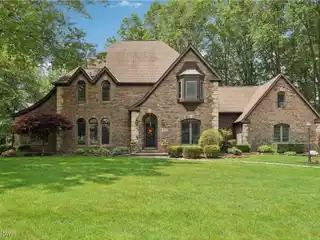 Grand Tudor Style with Heated Three-car Garage