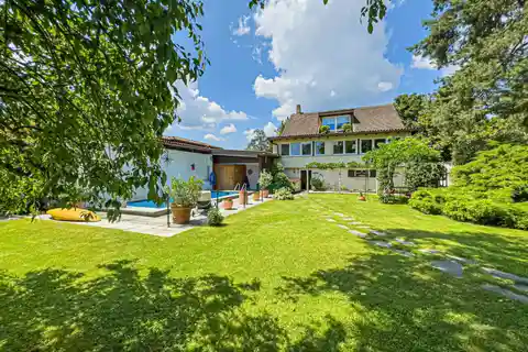 Villa Nestled in Lush Greenery Featuring a Swimming Pool and Proximity to Lake Lugano