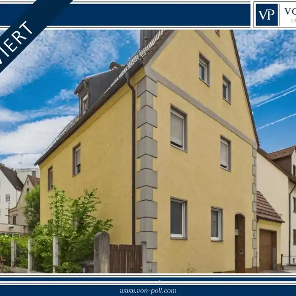 WELL-KEPT THREE-FAMILY HOUSE