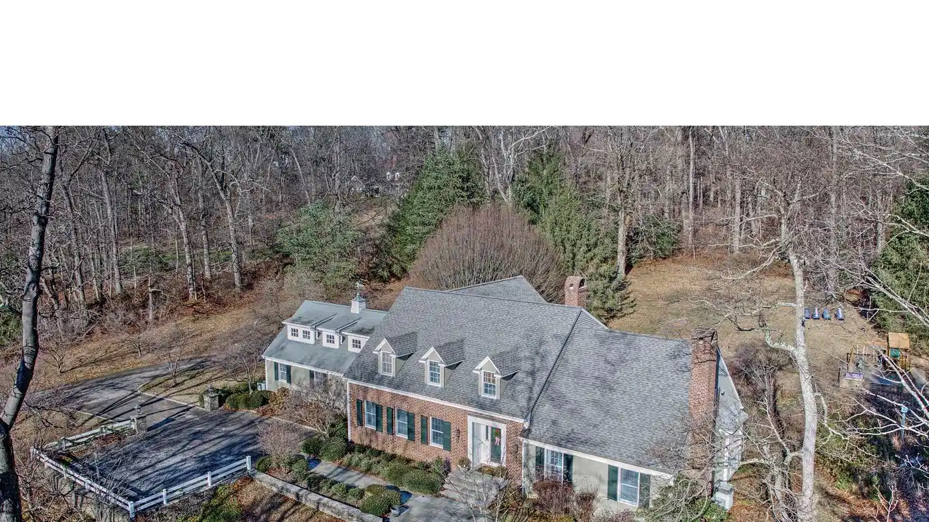 Gracious Colonial on over Six Acres in a Quiet Cul-de-sac Neighborhood