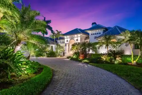 Magnificent Estate Home Surrounded by Tranquil Lake and Preserve Views