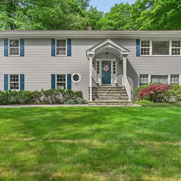 BEAUTIFULLY MAINTAINED RAISED RANCH