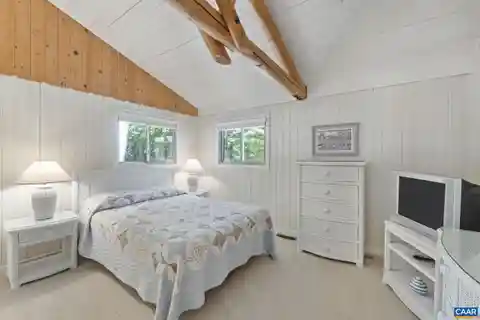 Lakefront Elegance with Docks, Beach, and Views