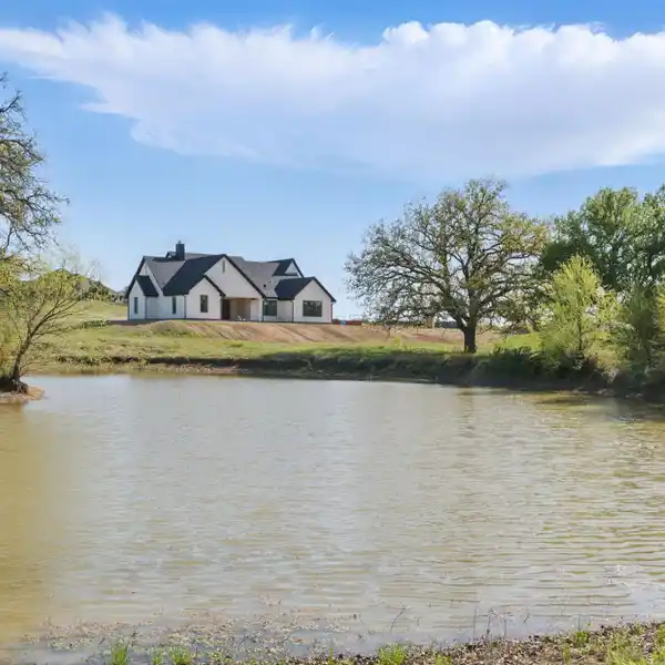 STUNNING NEW BRICK HOME ON 10 ACRES