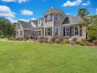Stunning Brick Home with Custom Details, Serene Views, and Unfinished Bonus Space