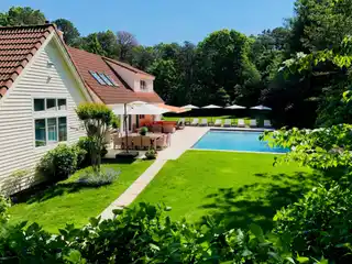 Extensively Renovated and Expanded Home on Manicured Grounds