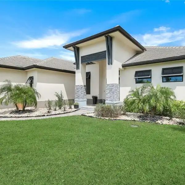 WATERFRONT POOL HOME IN PRESTIGIOUS TARPON ESTATES