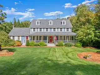 Center-Entrance Colonial with Dreamy Wrap-Around Porch