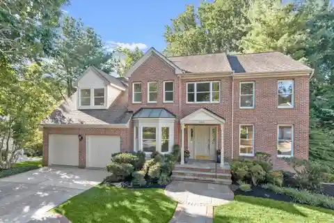 Beautiful Brick-Front Home on a Wooded Lot