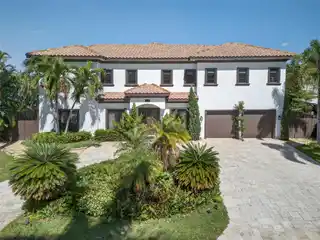 Modern Coastal Estate with Tropical Pool Oasis