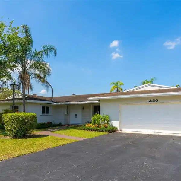 METICULOUSLY MAINTAINED HOME ON A HUGE CORNER LOT