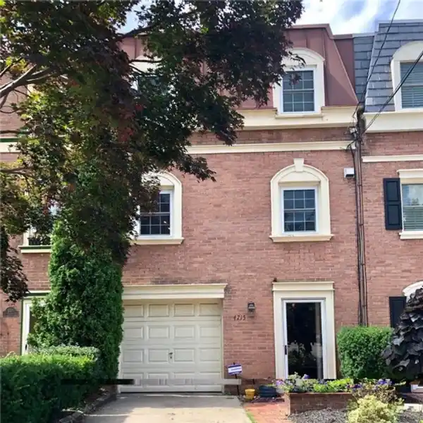 TREE-LINED ELEGANCE STEPS FROM CAMPUS LIFE