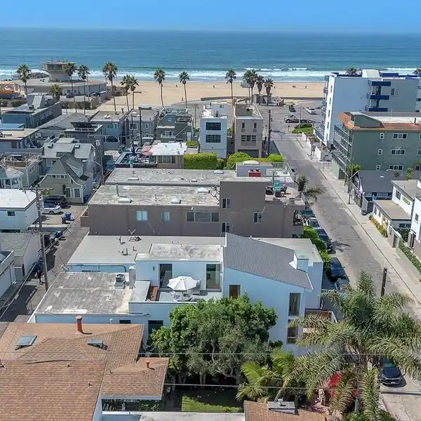 ARCHITECTURAL COASTAL HOME JUST MOMENTS TO THE SAND