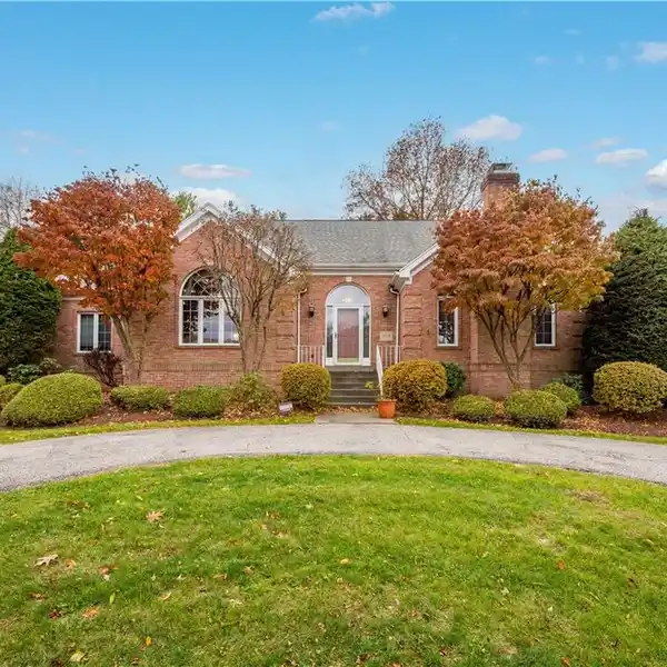 SPRAWLING CAPE COD WITH TIMELESS CRAFTSMANSHIP AND CHARM