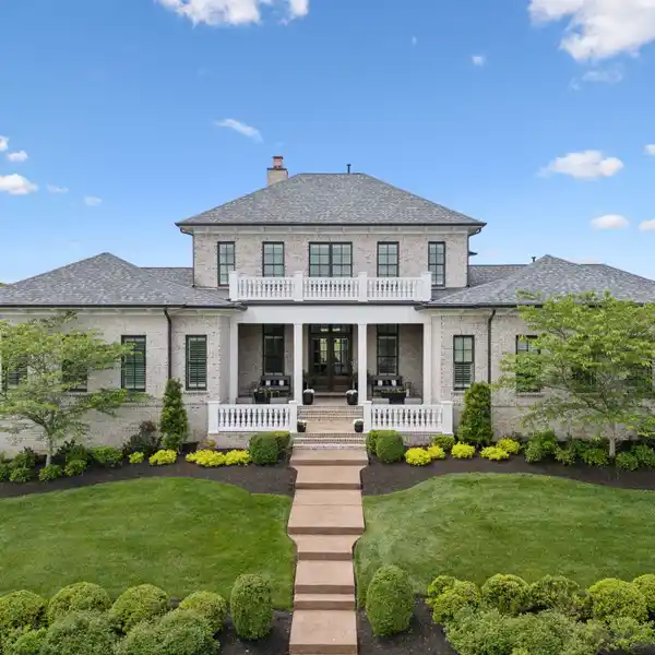 BEAUTIFULLY CRAFTED ALL-BRICK HOME IN THE GROVE