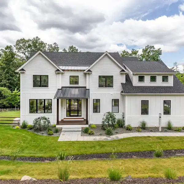 EXQUISITE NEW CONSTRUCTION IN A DREAM SETTING