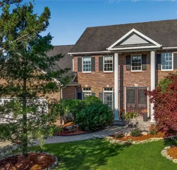 BEAUTIFULLY MAINTAINED HOME WITH POND VIEWS