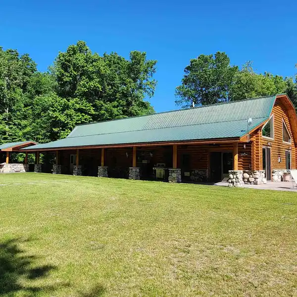 BEAUTIFUL LOG HOME ON 15 ACRES