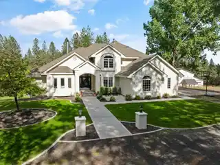 Exceptional Home on Five Wooded Acres