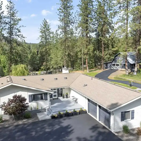 RENOVATED RANCHER ON CLOSE-IN GATED ACREAGE WITH HISTORIC BARN