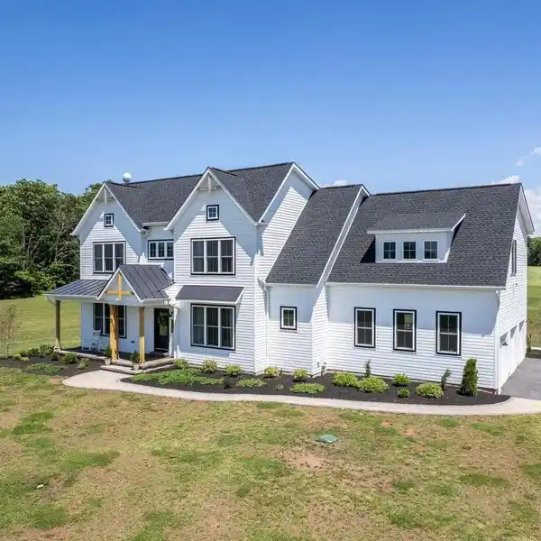 CONTEMPORARY COLONIAL ON THREE SCENIC ACRES