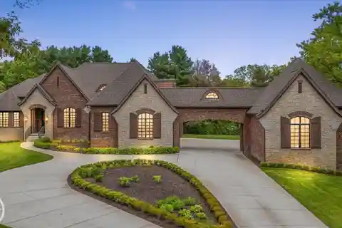 Stunning Custom Ranch with Six-car Garage