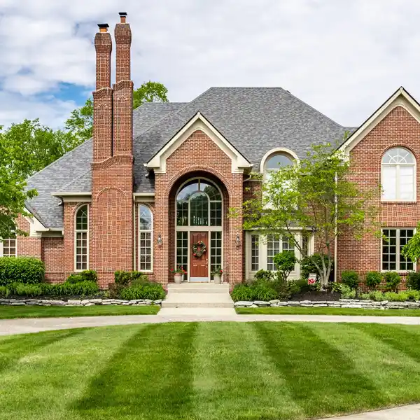 CUSTOM ESTATE WITH SERENE WATERFRONT SETTING