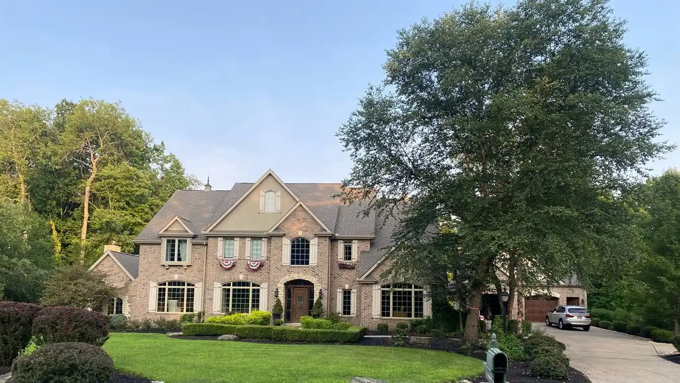 Elegant Custom Home on Private Wooded Property