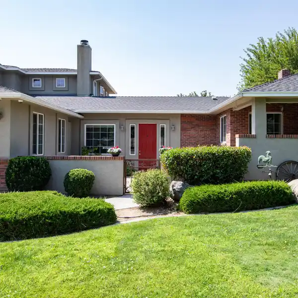 VERSATILE HOME ON JUST UNDER AN ACRE