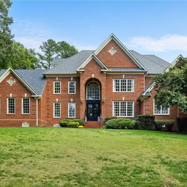ONE-OF-A-KIND THREE-STORY BRICK HOME