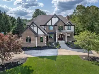 Elegant Brick Tudor with Spacious Outdoor Living