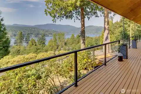 Custom Log Home with Panoramic Lake and Mountain Views